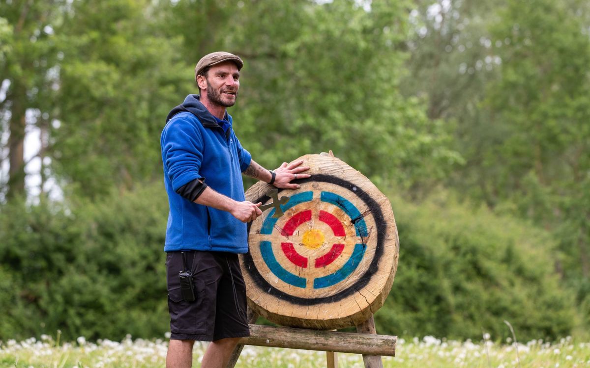 Willen Lake team member with axe target board