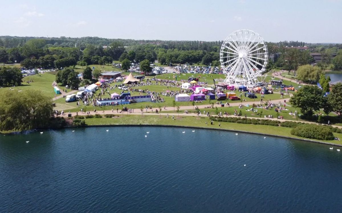 Drone view of lake and Big Doggie Do event