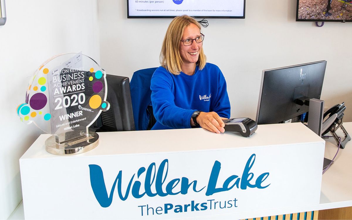 Willen Lake team member behind reception
