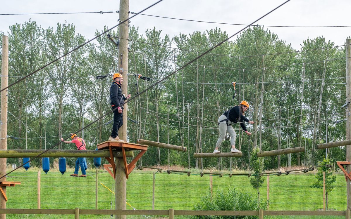 Child on Treetop Explorer high ropes course at Willen Lake