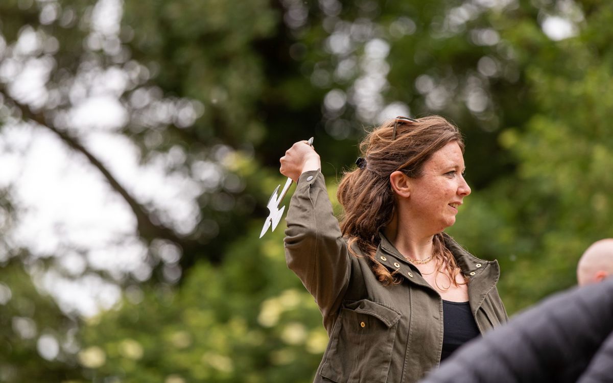 Person throwing axe