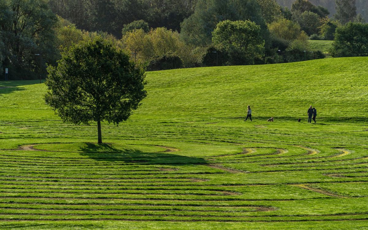 Labyrinth maze with walkers at Willen Lake in Milton Keynes