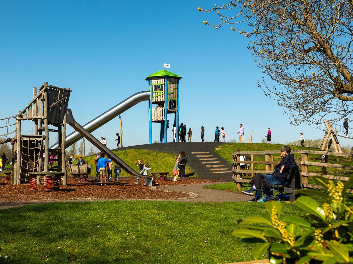 Families playing on the playground at Willen Lake